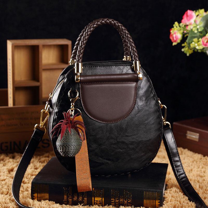 Clara | Bolso Redondo Vintage Detalles Trenzados Elegancia