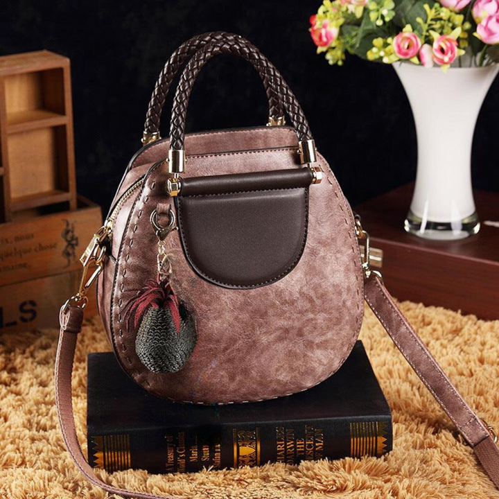 Clara | Bolso Redondo Vintage Detalles Trenzados Elegancia