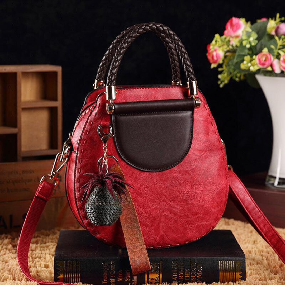 Clara | Bolso Redondo Vintage Detalles Trenzados Elegancia