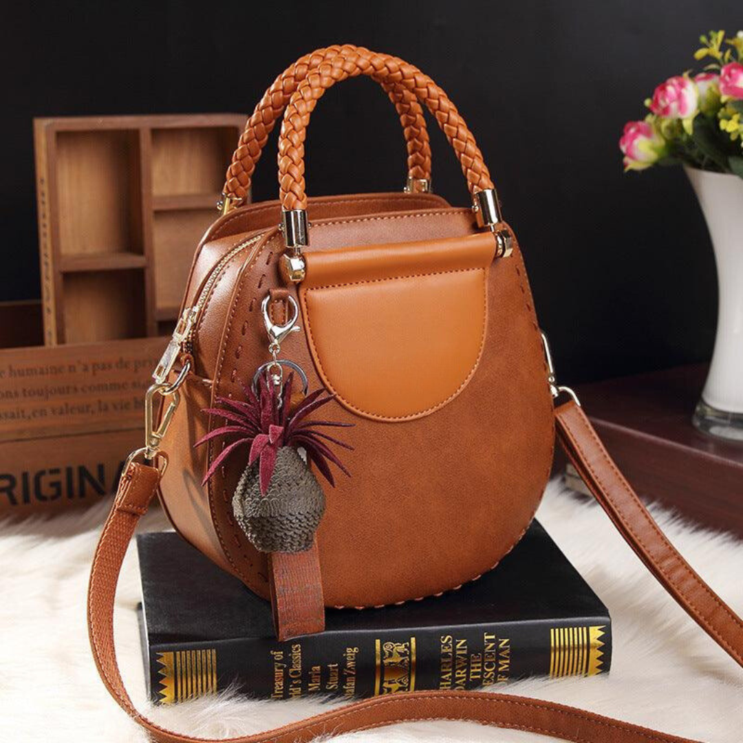 Clara | Bolso Redondo Vintage Detalles Trenzados Elegancia